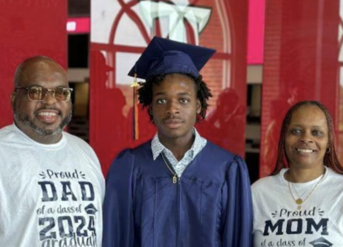 La'Tavion Johnson, 18, was killed in a Nov. 10, 2024, shooting that injured 16 others on the campus of Tuskegee University. He is shown here with parents Larry and Tamika Johnson. Credit: Carol Robinson